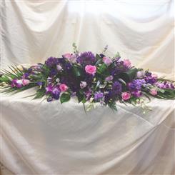 pink,lilac casket spray
