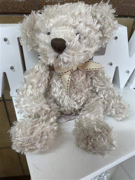 Beige shop teddy bear